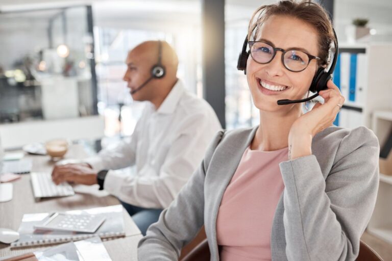Team of professionals collaborating and communicating effectively in a modern office.