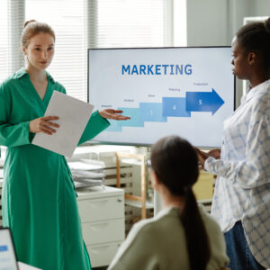 Woman giving business presentation for colleagues