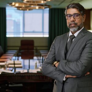 confident-businessman-in-a-modern-office-setting-2026-01-09-06-50-58-utc-scaled-1.jpg