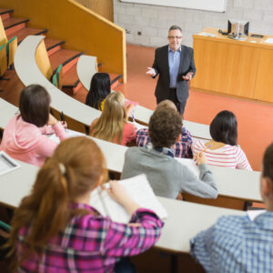 elegant-teacher-with-students-sitting-at-the-colle-2026-04-13-23-49-54-utc