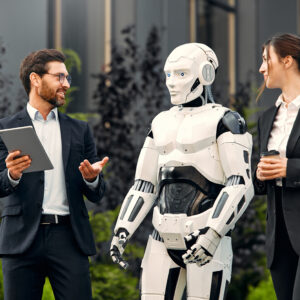 Robot with businessmen on the street near the building