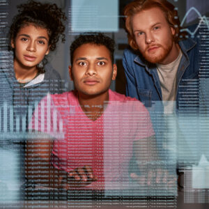 Young team of data analysts are captivated by the code