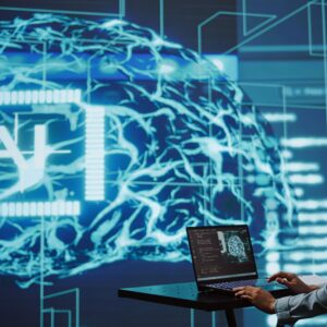 AI computer scientist using laptop for business data analysis in high tech workspace